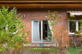 S&P | Terrasse - Farge | Toller Bungalow mit großem Grundstück und Doppelgarage in Weserlage
