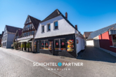 S&P | Straßenansicht - Hoya | Kernsaniertes Mehrfamilienhaus mit Gewerbefläche und Stellplätzen