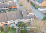 S&P | Drohnenansicht - Achim | Ausbaufähiges Reihenmittelhaus mit Garten und separater Garage