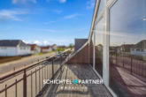 S&P | Balkon - Uphusen | Rentables Wohn- und Geschäftshaus mit Hinterhof und Autohalle