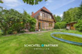 S&P | Seitenansicht - Aschwarden | Gepflegte Doppelhaushälfte mit Carport und weitläufigem Garten