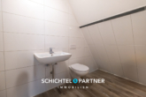S&P | Gäste-WC - Hoya | Kernsaniertes Mehrfamilienhaus mit Gewerbefläche und Stellplätzen