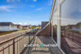 S&P | Balkon - Uphusen | Rentables Wohn- und Geschäftshaus mit Hinterhof und Autohalle