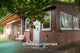 S&P | Außenansicht - Farge | Toller Bungalow mit großem Grundstück und Doppelgarage in Weserlage