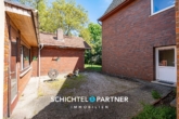 S&P | Innenhof - Ritterhude | Großes Zweifamilienhaus mit schönem Garten und zwei Garagen